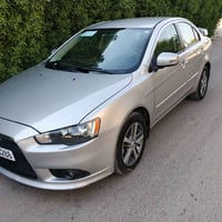 للبيع لانسر قرش موديل 2015 وارد خليجي محرك 2000 السياره جديده ماشيه 97...