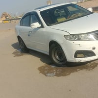 اوبتيما • ٢٠٠٩ • صبغ وتبديل باب