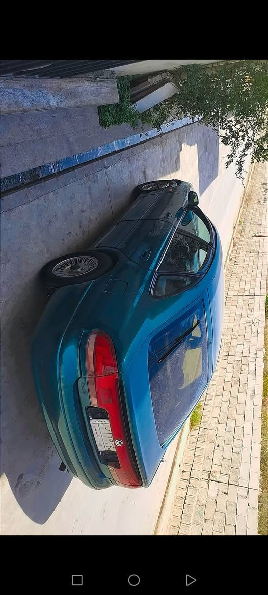 مازدافاسوليا موديل١٩٩٢ كير عادي سه نه وي كه سك ره قه م الماني  بي ده حم بي ليدراو كيرو مه كينه بي عه يب ته بريده كه رمي كيجي بنزين بريك حماوه مركزي كونترول ته نزيل شاشه ايبات هه مو مزبوت توندي تولي به شه رت اكه ر مشته ري تيل بكه ***********
***********
