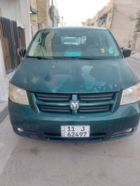 دوج كرفان موديل ٢٠٠٩للبيع  باسمي رقم بغداد تحويل ثاني يوم تبريد ٣ قطع ...