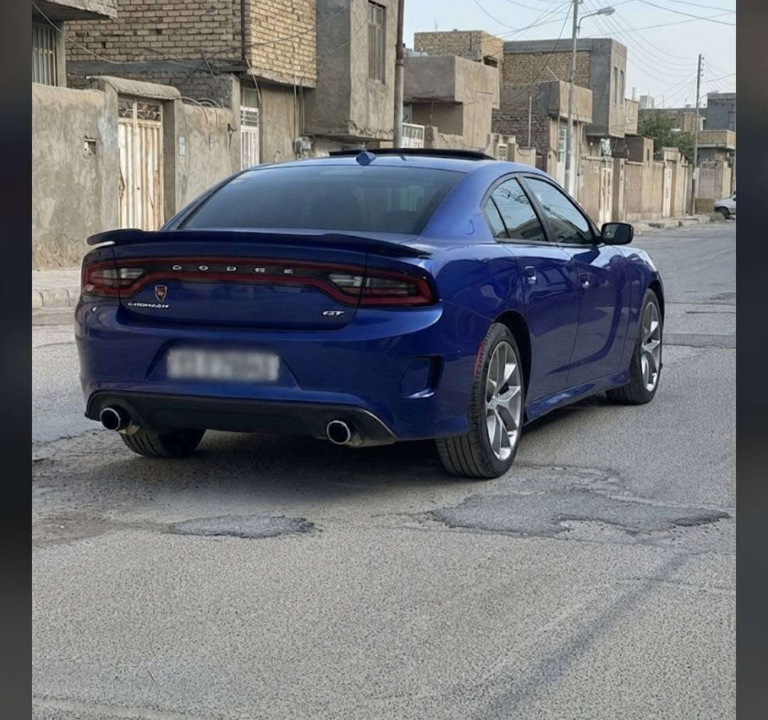 🔥 للبيع خليجي مكفول  Dodge Charger GT موديل 2021 🔥  
٢٧٠$
رقم بغداد 
سيارة نظيفة جداً وبحالة ممتازة.  

المواصفات:  
✔️ محرك 6 سلندر 3.6 لتر  
✔️ قوة 300 حصان  
✔️ جير أوتوماتيك 8 سرعات  
✔️ شاشة كبيرة + Apple CarPlay و Android Auto  
✔️ كاميرا خلفية + حساسات  
✔️ تشغيل بصمة  
✔️ جنوط رياضية 20 إنج  
✔️ عادم دبل + سبويلر خلفي  
✔️ إنارة LED  
بعد بيها مواصفات هواي موصفات الخليجي معروفة

🚗 اللون: أزرق مميز  
📍 السيارة جاهزة للفحص والسونار  

للاستفسار ***********
مكان السيارة ناصرية
