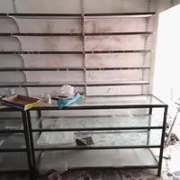 بغداد الكرخ • رفوف حديد ١٢٠سم • فاترينات ٩٠×٢٠٠ ٢