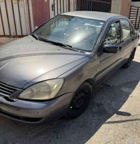 لانسر • ٢٠١٠ • اوتوماتيك