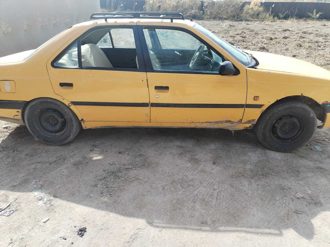 سلام عليكم بيجو 405 مديل ٩ ما مسجله هيئه  سعر ١٨ وبيها مجال رقم الهاتف *********** مكانها بابل محاويل
