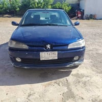 بيجو للبيع 2001 سنويه جديد مشروع وطني كوبون بانزين ماكو تدفه تبريد شغا...