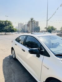 كورلا تجميع صيني باب اول مواصفات معروفه 2022  رقم بغداد   سونار بالصور...