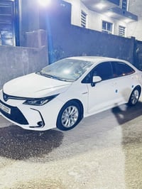كورلا هايبرد فول مواصفات  للبيع موديل 23  رقم بغداد  السعر 135 بيها مج...
