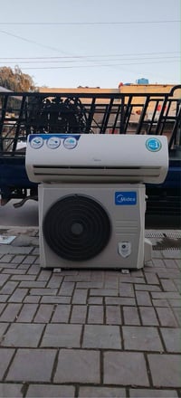 ميديا • ٢طن • تدفئة وتبريد