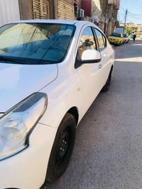 نيسان صني هندي بليتة زركة  موديل ٢٣  ماشية ١٢٤ الف (( شلوووون ما ادري ...