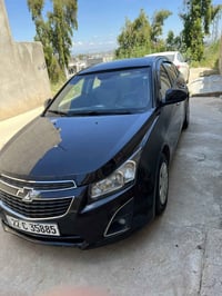 شوفرليت كروز 2013 LS  حادثها رصعات وشخوط وبارد فقط بدون صبغ  كير ومحرك...