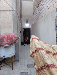 النجف الاشرف حي العسكري • بيت طابقين • ١٠٠م