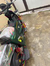 دراجة كهربائية • أبيض وزيتوني • كركوك