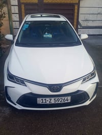 كورلا هايبرد 2025 ماشيه 26 الف سياره كلش نضيفه بيها باب السايق مبدل بل...