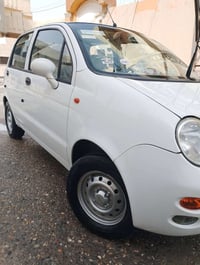 كوكو للبيع سياره  كير مكينا شرط موديل 2013رقم الهاتف07735985120