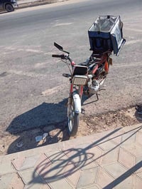 دراجه جني محرك مفتوح  سعر 200 قفل 07723453067