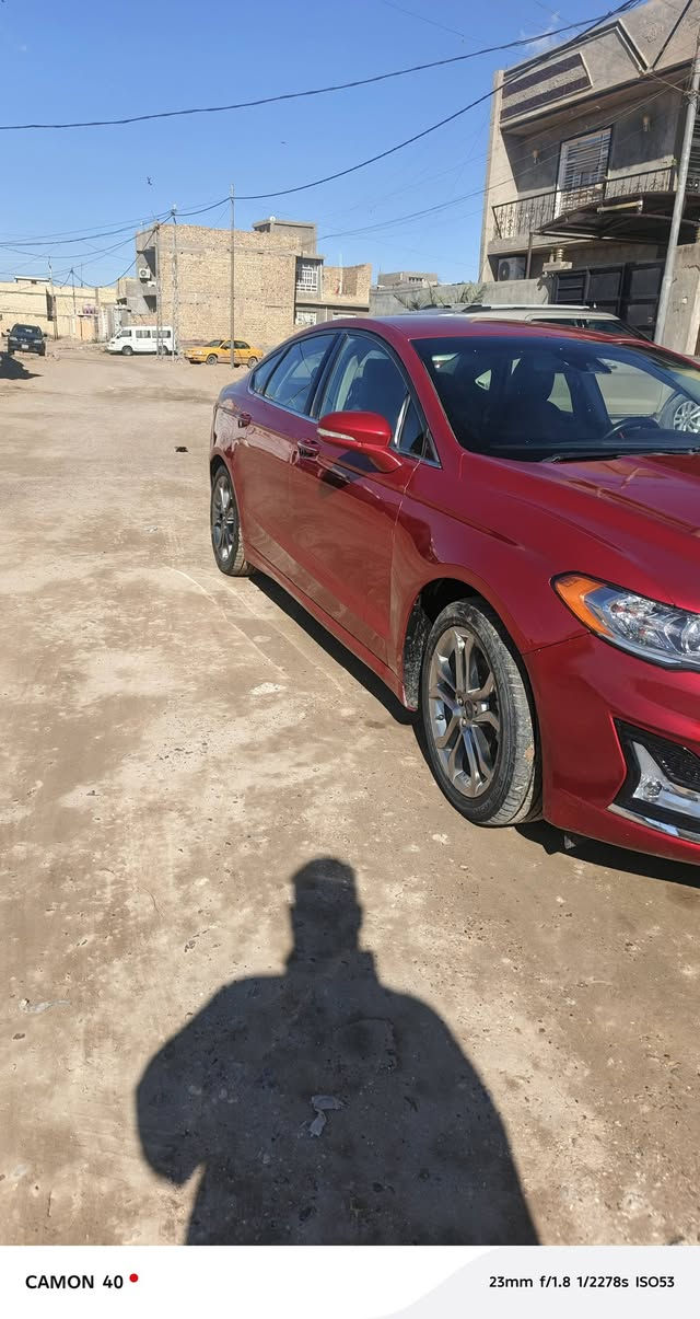 ‏‎       ——— لـلـبـيع  ———

‏‎ فورد فيوچن .      —      Ford Fusion

‏‎وراد أمريكي.        —  بدون ايرباك 

‏‎الموديل               — 2020 النداء الاخير 

فئة                     se اعلى فئه بالفورد فيوجن

حجم المكينه 1.5تنفس طبيعي يعني تسحك عادي محسن

‏‎اللون                   — احمر  

المسافه المقطوعه — ١٤٠ ميل

‏‎المواصفات 
- تدفئه تبريد كشنات
-تدفئه ستيرن
-خزن ميموري كراسي
- تشغيل عن بعد
‏‎- بصمة تشغيل
بصمة أبواب -
‏‎-ترحيب عند الاقتراب 
‏‎- شاشه كبيره تدعم نظام الأبل كار باي ونظام الاندرويد 
‏‎- شاشه عداد 
‏‎- ستيرن بحركه كهربائيه 
‏‎-تبريد منفصل 
‏‎- بگ لايت LED 
‏‎- كود باب 
‏‎-تحكم ستيرن جهتين 
‏‎-تحديد سرعه 
‏‎-مانع انزلاق 
‏‎-ليد نهاري
‏‎-گير ماوس 
‏‎-كامره خلفيه دواره
‏‎- كراسي كهرباء السائق و السكن
- اناره داخليه بلادي
مواصفات خير من الله بعد متخلص ١/١

 رقم السياره    — بغداد 

‏‎موقع  السياره — بغداد — تاجي سبع البور 

‏‎للأستفسار.     *********** رقم وتساب السعر ١٢٥
