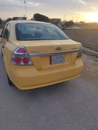 سياره افيو موديل 2010رقم انكليزي بأسمي سنويه لل2031بيه باب مصبوغ وره ا...