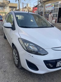 مازدا ياباني 2014 خليجية محرك 1500 مكفولة كفالة عامة من كل النواحي بيه...