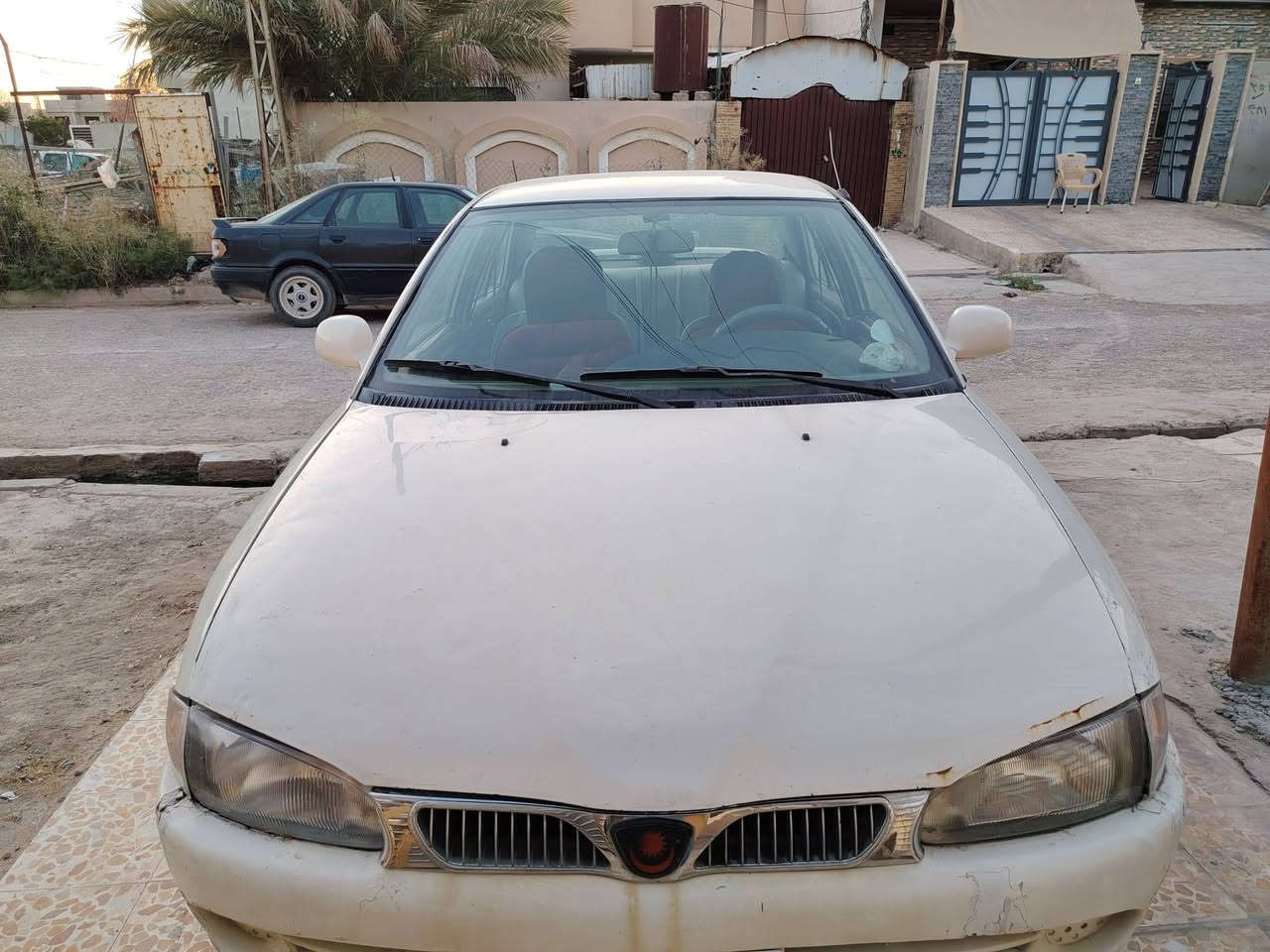 بروتون موديل 2004 كير أوتوماتيك بيها قطعتين صبغ جاملغ أمامي رقم بغداد مشروع وطني ،سنويه بأسمي سكني موصل ***********....*********** السعر ٤٧ بيها مجال
