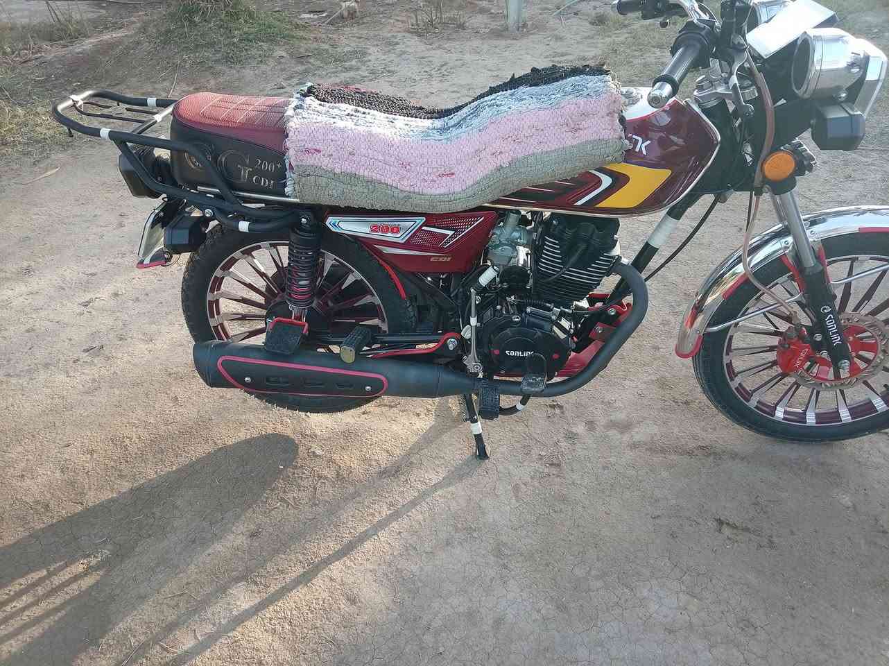 دراجة لبيع موديل 25 محرك 200 اوراق كاملة نفس نضافة لي بل صورة 800 وبيهة مجال قضاء لمحاويل  ***********
