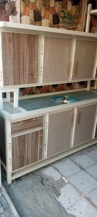 مرمر اصلي • ألمنيوم اصلي • تبطين الكاونتر