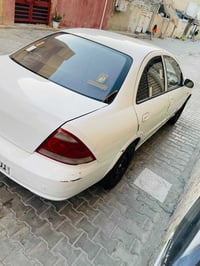 نيسان سني 2009 رقم بغداد انكليزي جديد سياره بسمي تبريت ثلج سياره موجود...