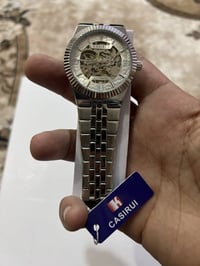 ساعة • اوتوماتيك • تكويك