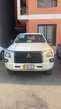 متسوبيشي موديل ٢٠٢٥ ماشيه ٣٠ الف  رقم بغداد وبأسمي ثاني يوم تحويل مكفو...