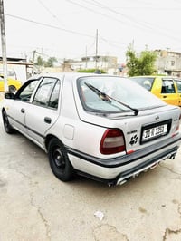 نيسان سني رقم بغداد مميز بسمي موديل  94 سياره بلاديه قطره صبغ مابيها م...