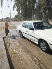 غسيل سيارات • مدخل الاقواس الاسكان