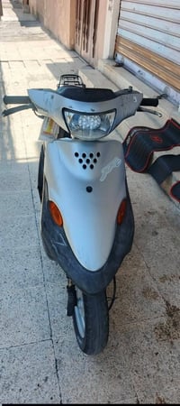 دارجة بيجي مكينة معمرة جديد  السعر 300 وبي نجال للشراي  07839237181