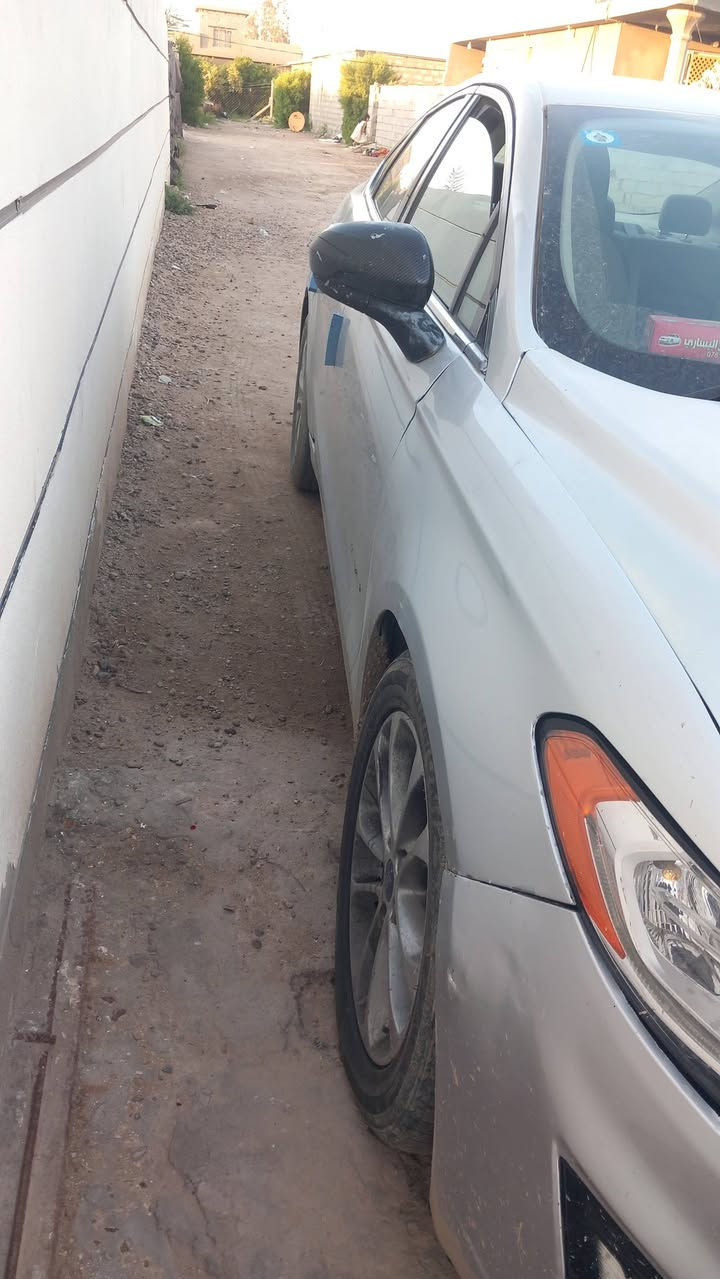 للبيع او مراوس باقل منها فورد فيوجن مواصفات موديل ١٩ رقم بغداد دولي باسمي هزة جديده سعر ٩٠ وبيها مجال *********** بيه واتساب العنوان اليوسفيه
