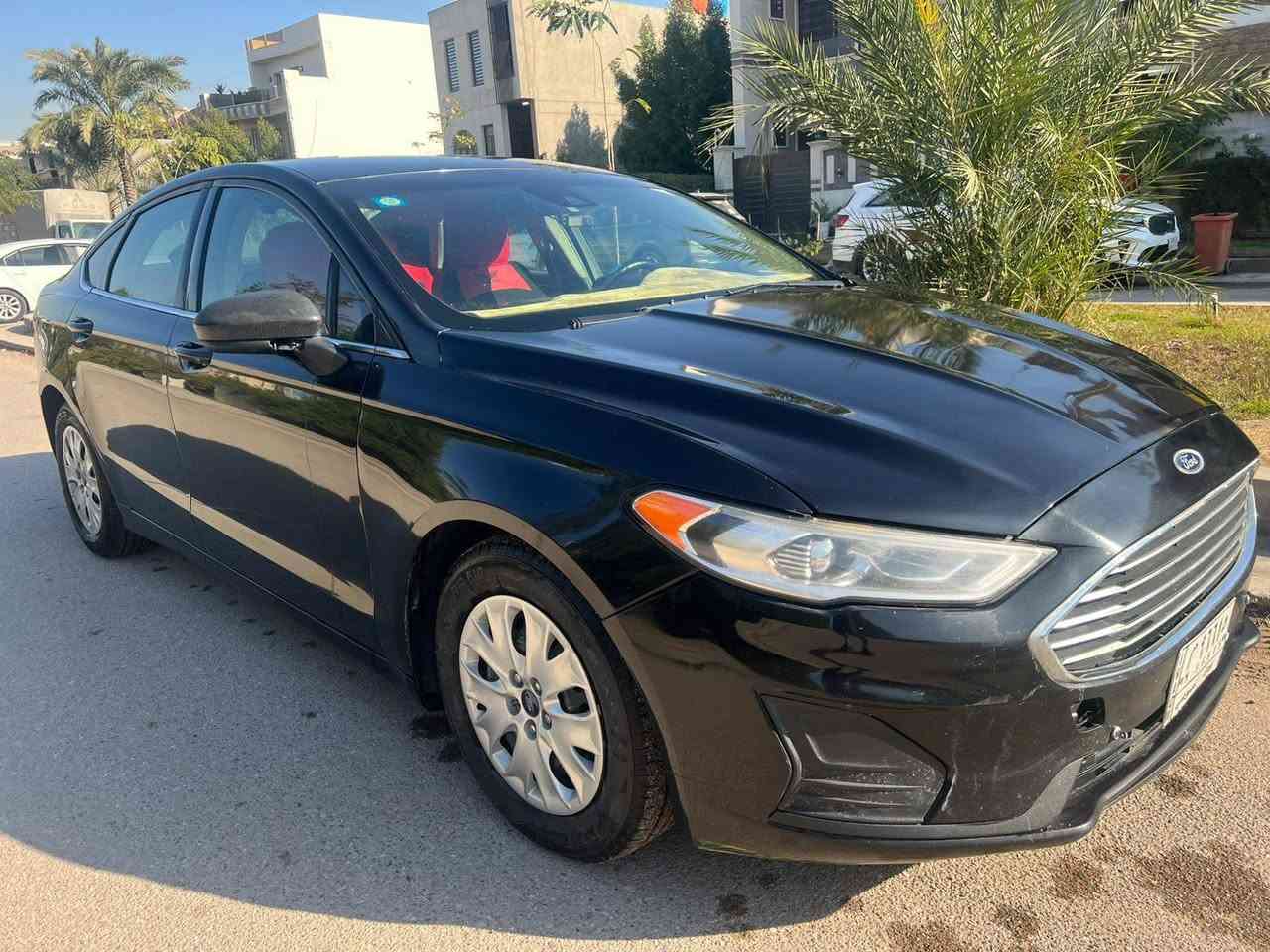 فورد فيوجن 2019 وارد امريكي ضررها كلش حلو بنيد فقط بدون اي دواخل... وهنا بالعراق صار بيها صبغ باب وجاملغ اثر شخط فقط...بدون معجون..بدون دواخل... السيارة بحالة ممتازة...كير ومحرك جيد جدا 2500 المرغوب
دوشمة وتخم تاير جديد وصدر امامي خلفي جديد وبالخير عالياخذها ..بيع او مراوس مكان السيارة بغداد حي القادسية السعر 105 قفل... قفل... رجاءا لان متوازي ابيع بهجي سعر...   وحلال المسلم غالي وتعبان بيه. 
الاتصال على الرقم ***********
