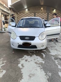 كيا بيكانتو 2009 رقم بغداد بأسمي كير محرك تبريد شغال شاشه كامره حساس ت...