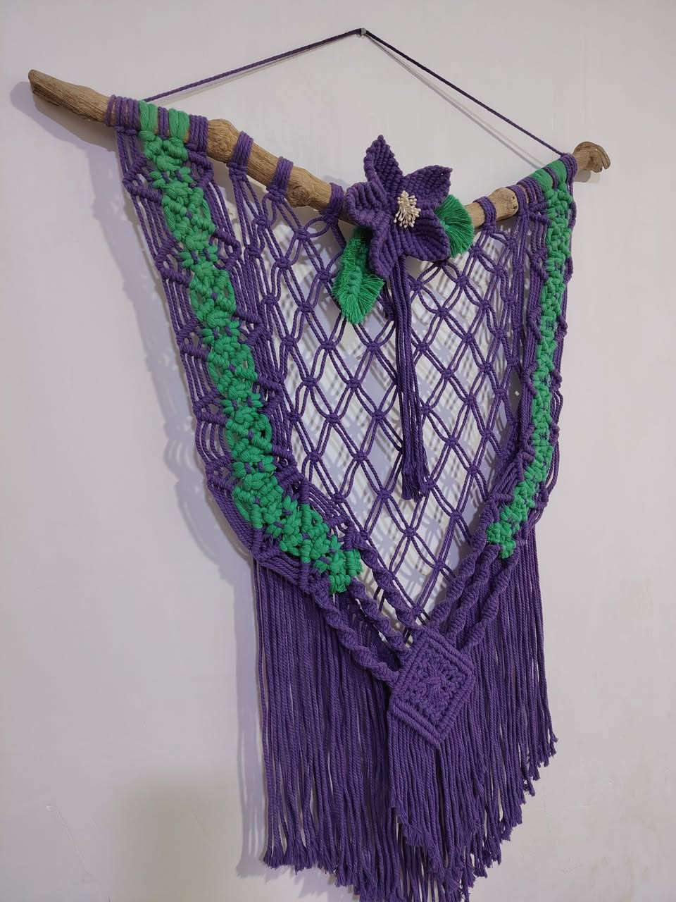 قطعة فنية مصنوعة يدويًا بعناية وجودة عالية، تضيف الدفء والشخصية لأي مكان.
تجمع بين اللونين الأرجواني والأخضر بتناسق جميل، وتتميز بعقد المكرمية المعقدة والزهرة البارزة على قطعة خشبية طبيعية.
مصنوعة من خيوط المكرمية القطنية عالية الجودة.
مثالية لتعليقها في غرفة المعيشة، غرفة النوم، أو حتى في الأماكن التجارية والمناسبات الخاصة.
وهي خيار رائع كهدية مميزة وفريد للأصدقاء والعائلة.
تتوفر بقطعة واحدة مميزة،
 للطلب والتواصل ***********
A meticulously handcrafted piece of art, this high-quality ornament adds warmth and personality to any space.

Beautifully blending purple and green, it features intricate macrame knots and a raised flower on a natural wood base.

Made from high-quality cotton macrame cord.

Perfect for hanging in the living room, bedroom, or even in commercial spaces and for special occasions.

It makes a wonderful and unique gift for friends and family.

Available as a single, distinctive piece.

To order, please contact ***********
#art #fyp #handmade #makrome #iraq #baghdad #erbil
