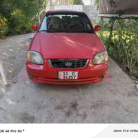 لاكسنت • ٢٠٠٤ • رقم بغداد