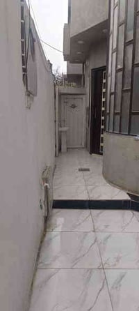 حي سومر منطقه ١١٢ • ١٠٠م • ٢ غرف نوم