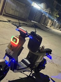 دراجا شحن خمس بطاريات 60v 20امبير يمشي 70 كيلو متر بلشحنه الواحده بي ن...