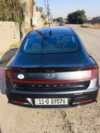 سوناتا هايبرد 2023 وارد امريكي محرك 2000  ماشية 35 الف ميل  سنوية جديد...