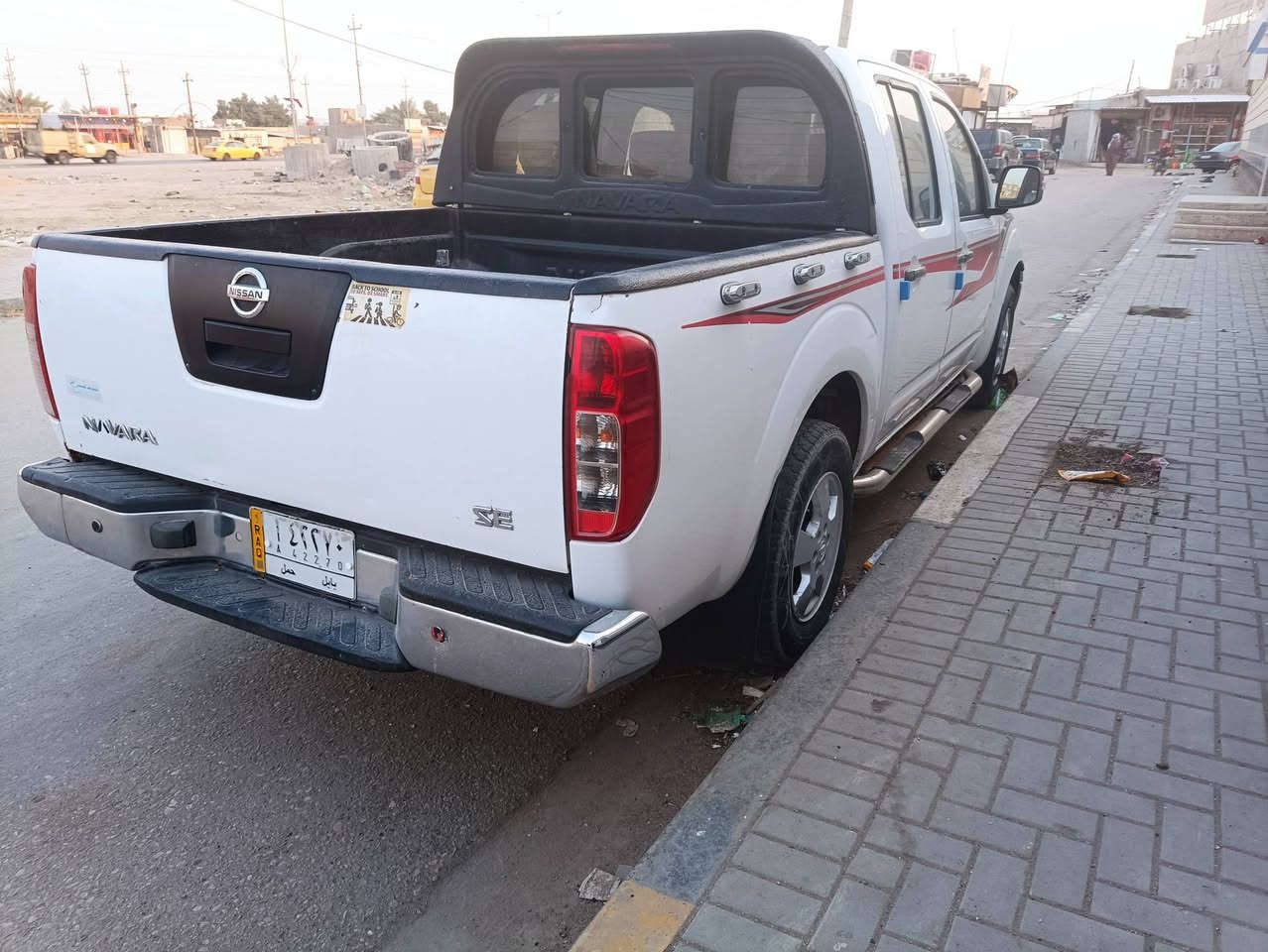 السلام عليكم شباب نيفارا مديل 2016للبيع او مراوس حسب القناعه سياره جاهز للأخير مكينه كير تبريد تخم تاير حداده ما تخسر عليها ربع رقم بابل مشروع وطني تحويل وين ما يعجبك راعيها يمي هم بلبصره سنويتها ل2027 سياره متعوب عليها الله شاهد وجاهزه كلش السعر ((125)) وبيها مجال حك الجيه مكاني بصره هارثه مفرق معمل ورق قرب مطعم مشمشه رقمي***********  بيه ضربا يم البك لايت جهة السايق كد شبر
