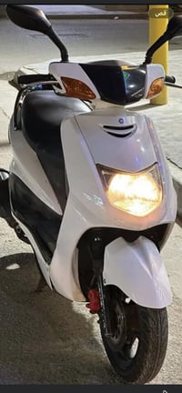 سكنس ياباني ستان كهرباء دراجه امرتبه وخير من الله لون ابيضّ دراجه نضيف...