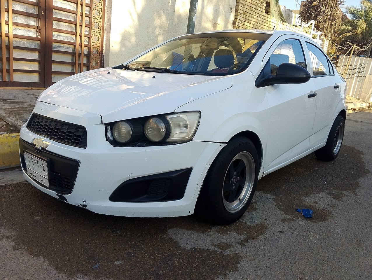 شوفرليت سونك خليجي ٢٠١٢ 
مواصفات عاديه 
بيها صفحة السايق الباب الخلفية معدل ومصبوغ 
نقص اشياء بسيطة 
رقم انكليزي / سنوية جديدة بأسمي ل٢٠٣٠
كوت / الزهراء 
***********
السعر 50$ وبيها مجال حگ النقوصات
