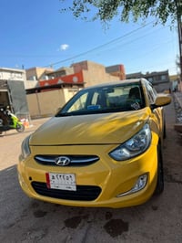 اكسنت • ٢٠١٥ • رقم بغداد