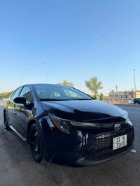 كورلا موديل 2022 وارد امريكي ضررها جاملغ وبنيد   فئة LE رقم بغداد بسمي...