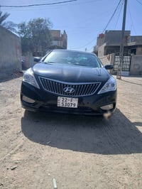 للبيع ازيرا ٢٠١٢ بإسمي رقم اربيل دولي سنوية جديدة  لون اسود بيهه تبديل...