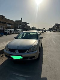 لانسر • ٢٠١١ • مكينة ٢٠٠٠