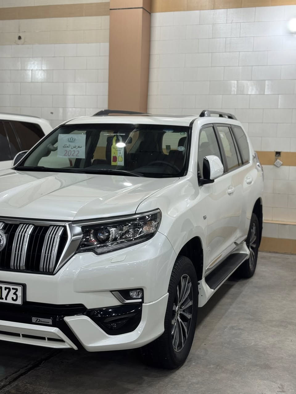 🧿معرض الملك لتجاره السيارات 🧿 
العنوان_ معارض النهضه _ الفرع الثالث _ فرع المصرف 

        تيوتا  برادو 2022 سبعينيه سبير تعليك 

#المواصفات

 🔹النوع :  تيوتا برادو 

🔹الفئة: TX.S

 🔹الموديل : 2022 لون ابيض  

🔹بصمة تشغيل عند بعد

🔹داخل قرميدي 

🔹بكليت لد 

🔹تحكم ستيرن

🔹ويل كب حجم 19 

🔹شاحن واير ليس

🔹شاش + كامره 

🔹حساس خلفي 

🔹كشنات جلد 

🔹كشنات عدد 2 كهرباء 

🔹مري شفط 

🔹فتحه سقف 

🔹كروس سرعه 

🔹بصمه + تشغيل عن بعد 

🔹ثلاث قطع تبريد 

🔹فتحت USB

🔹شاحن واير ليس 

🔹ثلاجه.  

🔹نضام الدفع الرباعي 

العنوان / بغداد / النهضة / الفرع الثالث فرع المصرف

========================
للاستفسار اكثر عن تفاصيل السيارة يرجى مراسلة صفحتنا على فيس بوك او الاتصال بالمعرض  مباشرة عن طريق الرقم الخاص في المعرض : 
📲***********
***********
