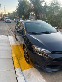 كورلا موديل 2019  رقم بغداد وارد امريكي لون اسود باسمي محرك 1800  المر...