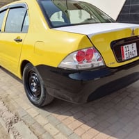 لانسر شركة عامه موديل 2010 السياره بيها صبغ حزام لا تبديل ولا ضربه مكي...