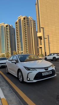 للبيع كورلا هايبرد  موديل: 2025 رقم بغداد تحويل ثاني يوم محرك 1800 هاي...